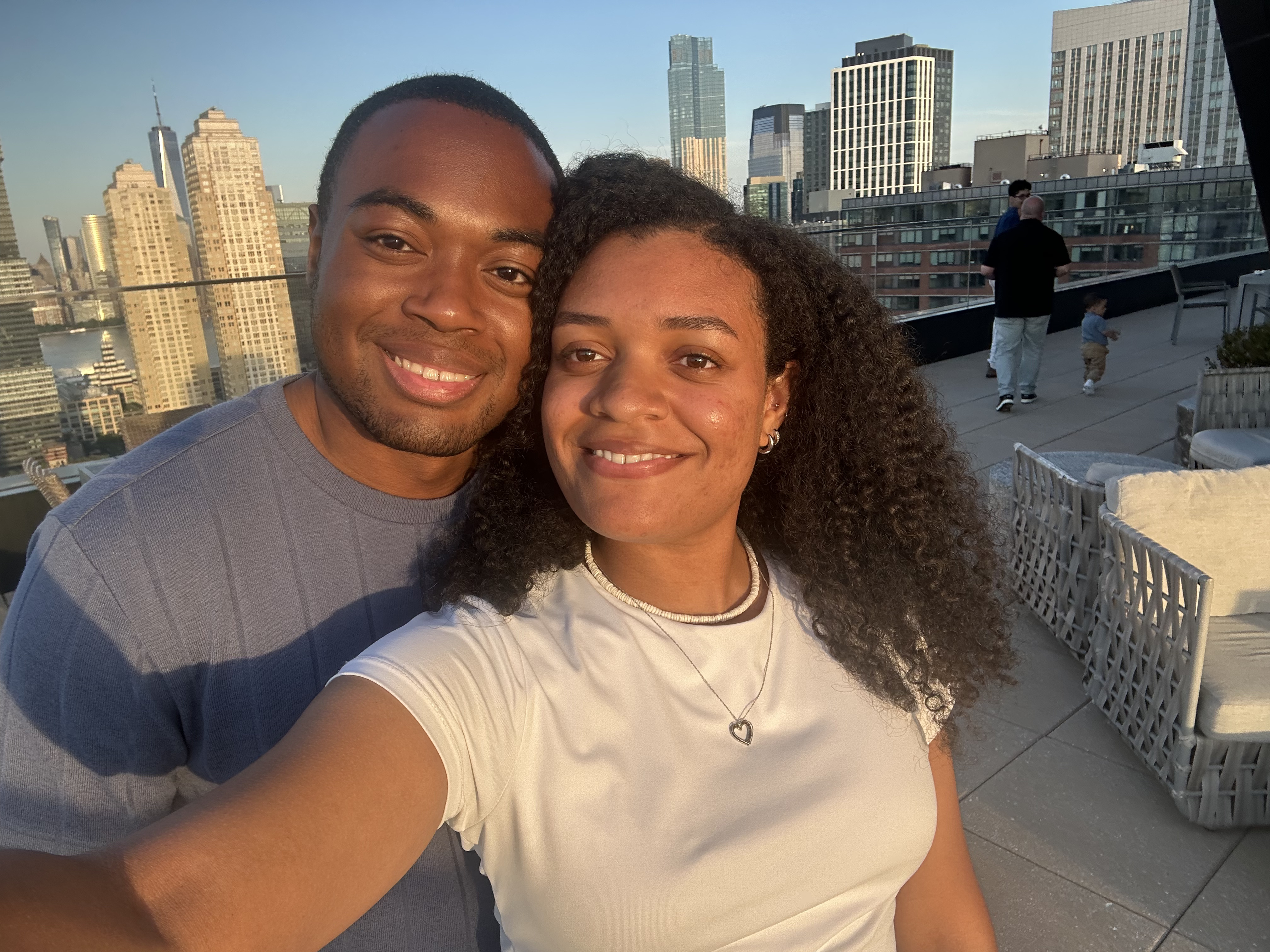 Jalen and Mikaela together overlooking the city